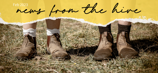 News From The Hive header over a background imge of kids on our farm in dirty workboots